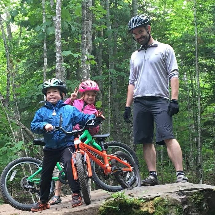 CHTC Board member Cory McDonald with family on the trails.